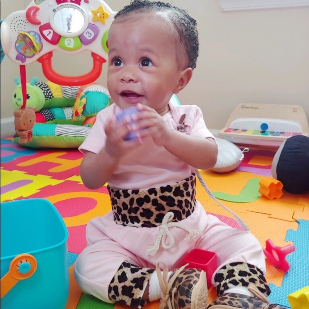 Baby girl pink/cheetah sweatsuit. Thin fabric, good for 50-60 degree weather.